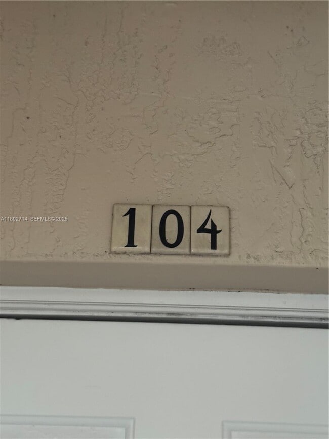 Building Photo - 5650 NW 115th Ct Unit 104