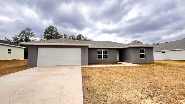 Building Photo - Charming 3 Bedroom, 2 Bathroom Home in the Lovely Marion Oaks of Ocala!