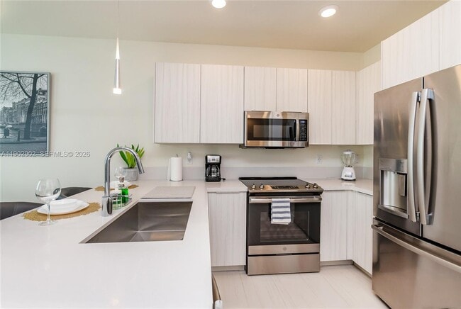 Building Photo - 6416 NW 102nd Ct Unit 302