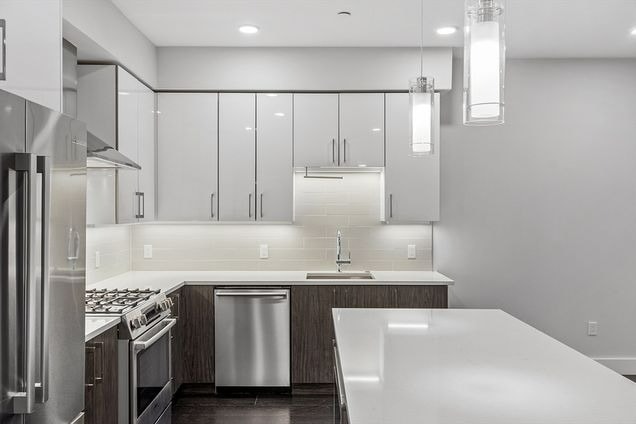 Photo - Modern 2BR / 2BA Condo with Private Deck & Garage Parking at The Post Unit Apartment 304