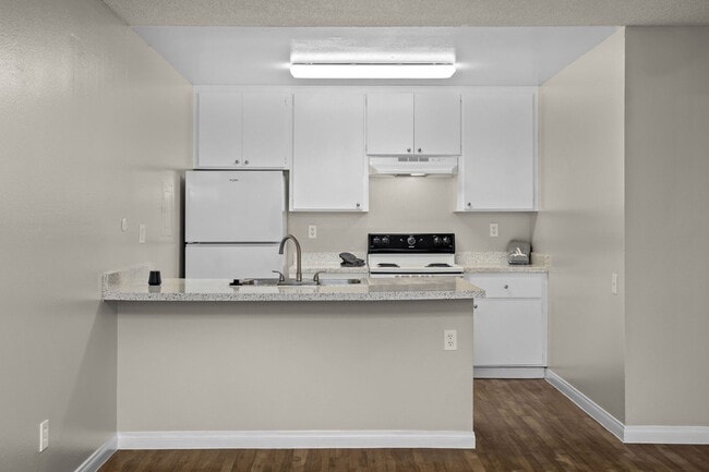 Kitchen at Bay Breeze Apartments in Costa Mesa, CA
