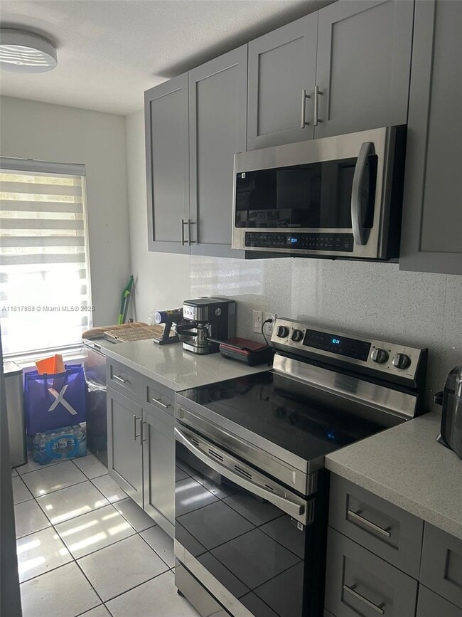 Photo - 8310 NW 10th St Townhome