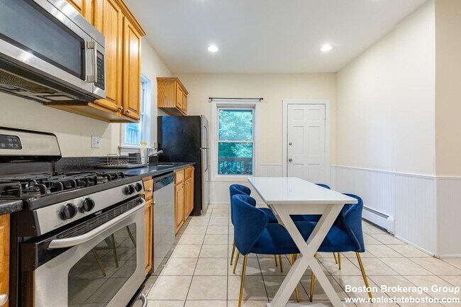 Photo - Renovated Apt Near NEU!  Laundry in Unit! 1k Rebate Upon closing with Promo