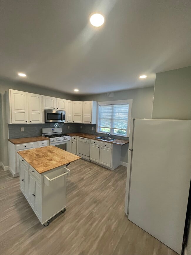 New Kitchen with Island - 557 W Graisbury Ave Unit House