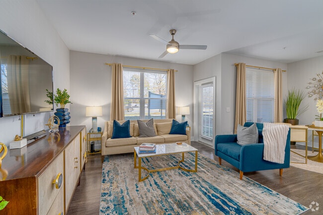 1BR, 1BA - 865 SF - Living Room - Overture Cotswold 55+ Active Adult Apartment Homes