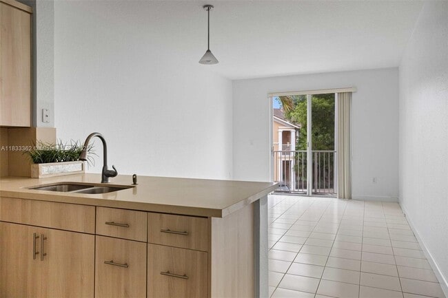 Building Photo - 17640 NW 73rd Ave Unit 201-19 Rental