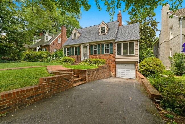 Photo - Elegant Center-Hall Cape Cod with Sunroom, Garage & Timeless Charm