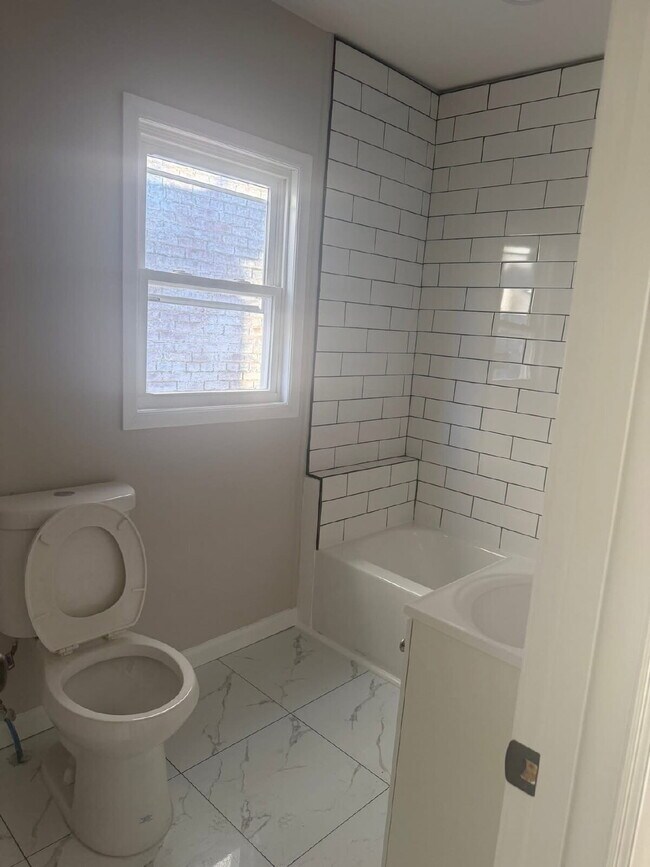 Photo - "Charming 4-Bedroom Townhouse in Trenton – Ideal Urban Living on MLK Jr. Blvd!"