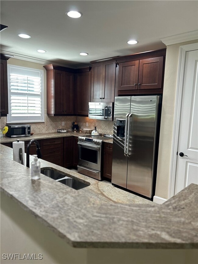 Photo - 8756 Bellano Ct Unit 1-104