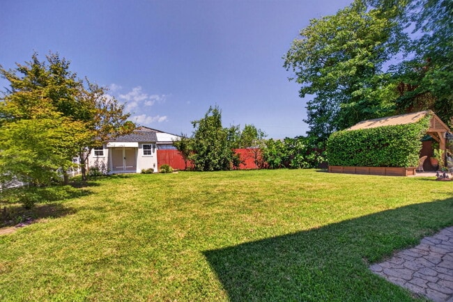 "Spacious 5-Bed featuring TWO PRIMARY SUITES with a beautiful backyard oasis in Norfolk!"