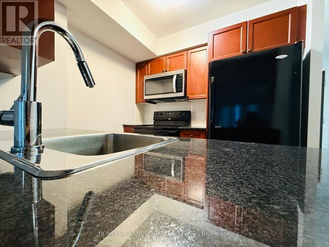 Photo - 135 Village Green Square Unit 2419