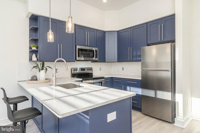 Building Photo - 4550 Mitchell St Unit 207 Rental