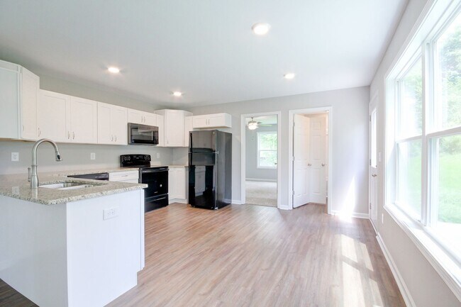 Photo - Two Story Duplex With Hardwood Flooring an...
