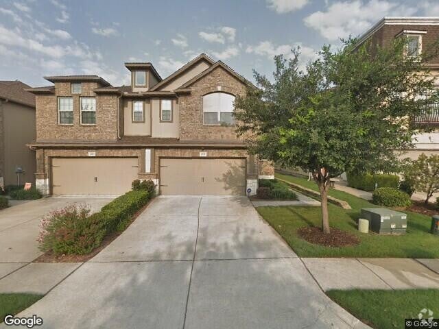Building Photo - MOVE IN READY - Spacious 2-story townhouse...
