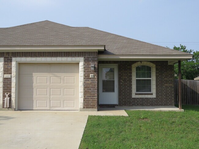 Photo - Discover modern living with a stylish edge in this beautifully designed 3 bedroom duplex! Unit B