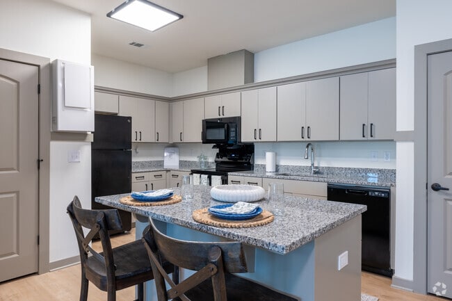 2BR, 1BA - 928SF - Kitchen - Capstone at the Oaks - 55+ Community