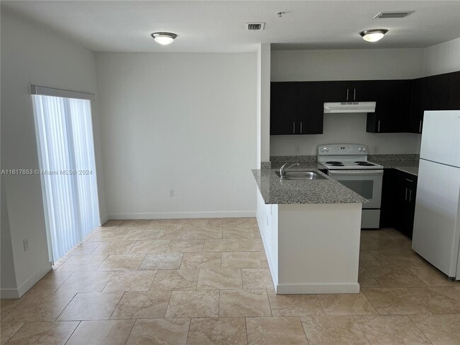 Photo - 7931 W 2nd Ct Unit 205
