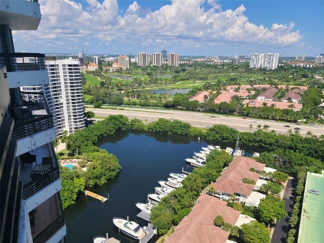 Building Photo - 3530 Mystic Pointe Dr Unit 2707