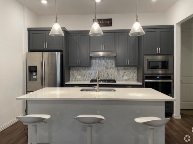 Building Photo - 9947 Michael Irvin St Rental
