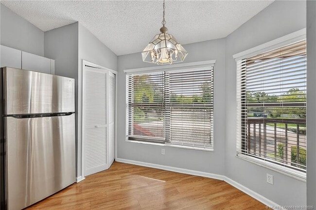 Building Photo - 6060 SE Martinique Dr Unit 202