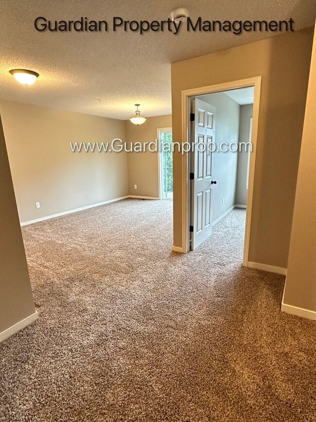 Photo - Champlin Town Home, 2 Car Garage, Dishwasher, Washer/Dryer, Balcony, July/Aug 1st Move In