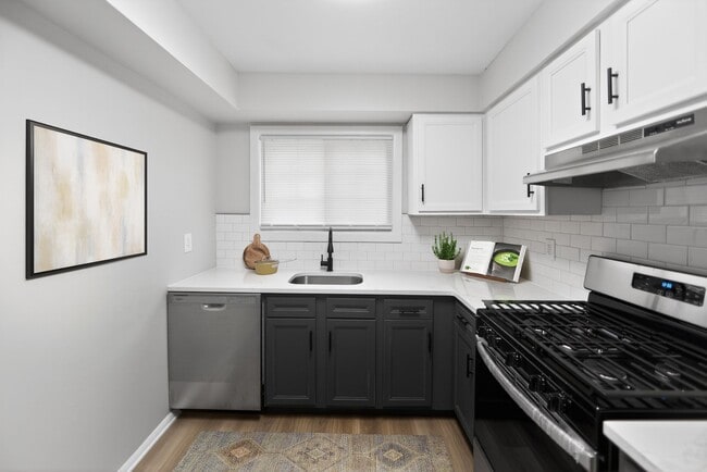 Step into the modern elegance of Lake Shore Park Apartments, where sleek cabinetry meets stainless steel appliances in your gourmet kitchen. Enjoy a vibrant community with top-notch amenities. Schedule your tour today and elevate your living experience! - Lake Shore Park Apartments