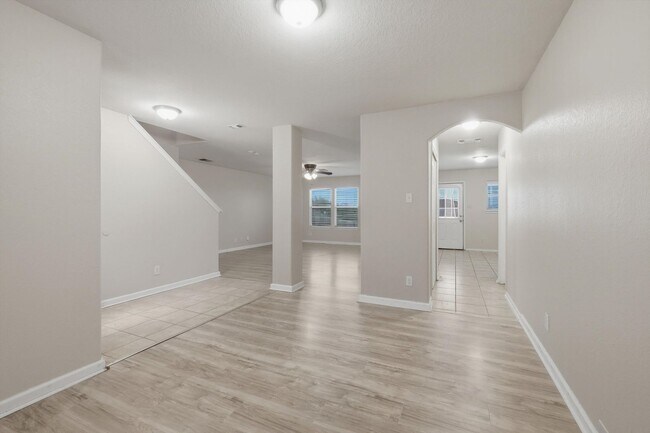 Photo - 4BR Home with Open Living Area & Included Appliances