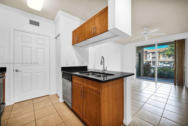 Building Photo - 6565 Emerald Dunes Dr Unit 103 + GARAGE