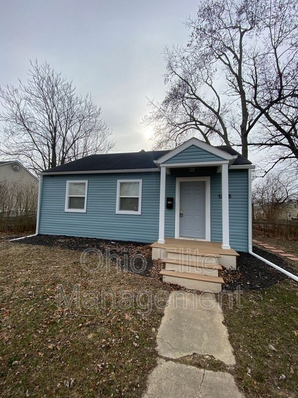 Building Photo - 1205 E 23rd Ave