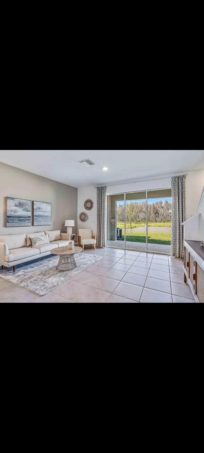 Photo - 32952 Tulip Petal Ln