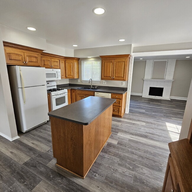 Photo - Updated 2 Bedroom Ranch with Open Living Room that Flows Through Kitchen, Dining Area to Great Ro...