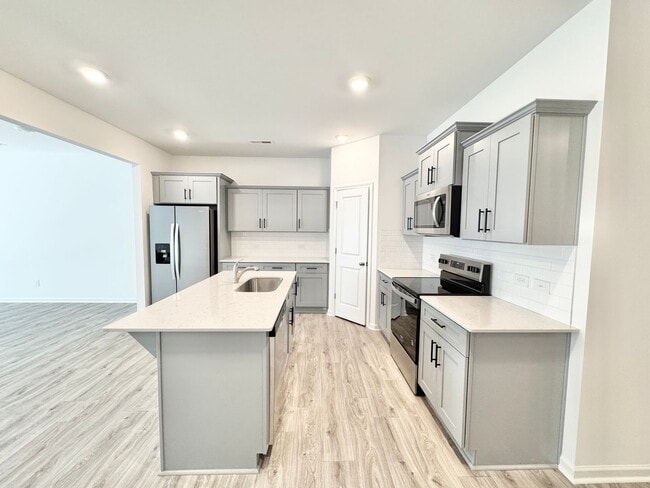 Photo - 3 br 2.5 ba townhome AVAILABLE JULY 16TH close to freeways and shopping!