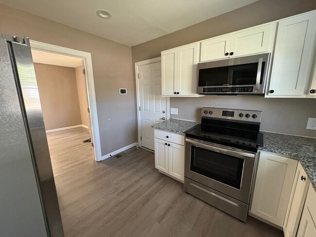 Photo - Cozy Living Spaces & Small-Town Energy!