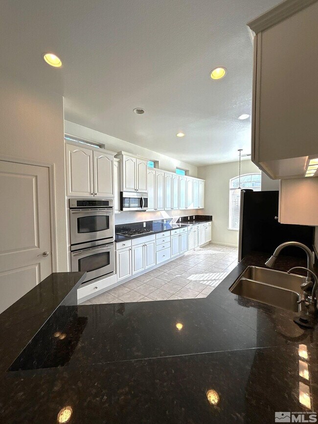 Photo - 9900 Wilbur May Pkwy Unidad 3402