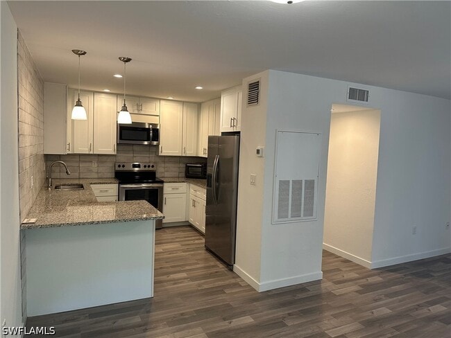 Building Photo - 3120 Seasons Way Unit 309
