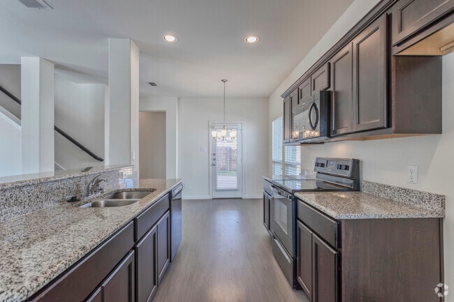 4BR, 2.5BA - 1697SF B1 - Kitchen - Brooklyn Village