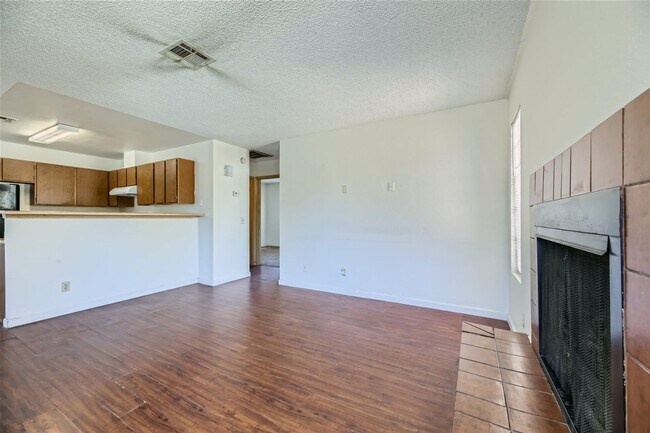 Photo - 2nd Story 2-Bed Condo with Tile Fireplace Unit D