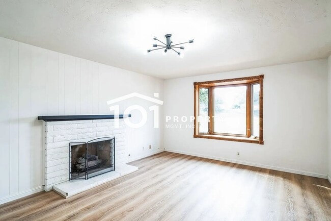 Photo - Spacious 4-Bedroom Home with 3 Bathrooms and a 2-Car Garage