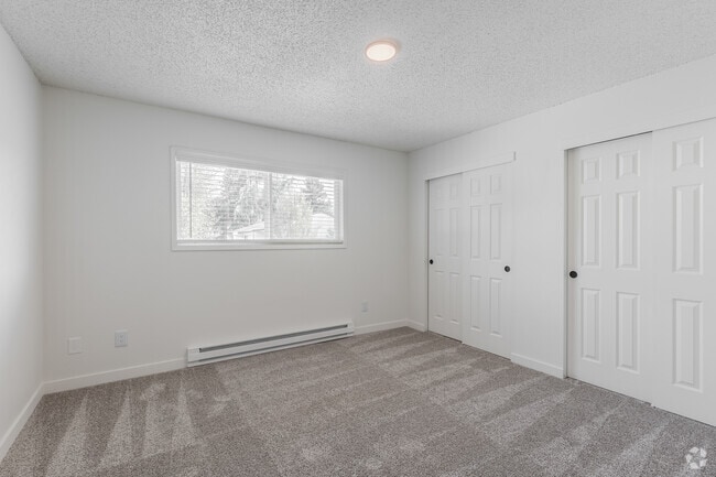 2BR, 1BA 984SF - Primary Bedroom - Firwood Station