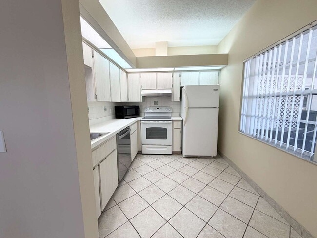 Photo - "Charming 2-Bed, 2-Bath Villa Retreat in New Port Richey!"