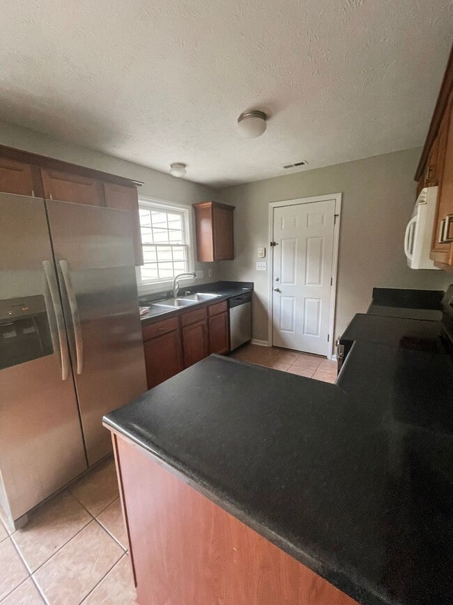 Photo - Coming Soon: 3 Bedroom 2 Bath - No pets