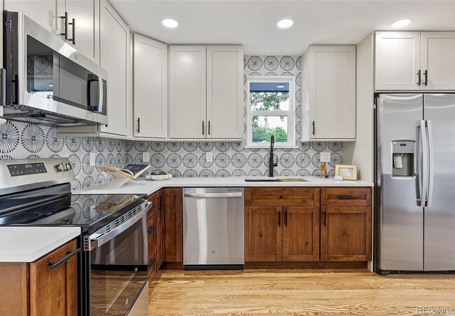 Kitchen - 5573 S Huron St Unidad Huron St