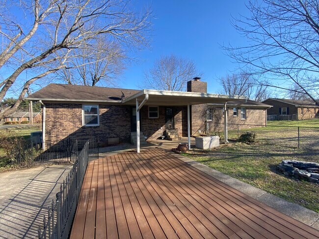 Lots of patio area with a big portion of it covered. - 114 Hickory Hills Dr