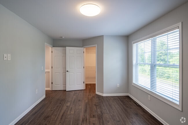 3BR, 2.5BA - 1700SF - Primary Bedroom - Roger Chaffee Apartments