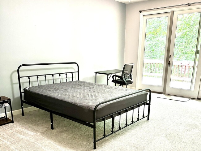 Photo - The Mylandia | Beautiful and spacious University City – Charlotte house with a backyard, offering...