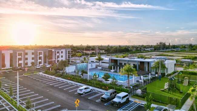 Clubhouse and Pool Area - The Avenue at Naranja Apartments