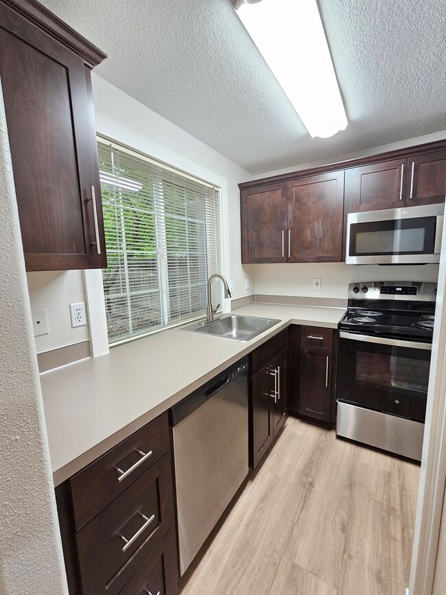 Photo - Large Updated 2 Bed, 1.5 Bath Townhouse w/ Washer & Dryer + Off-street Parking
