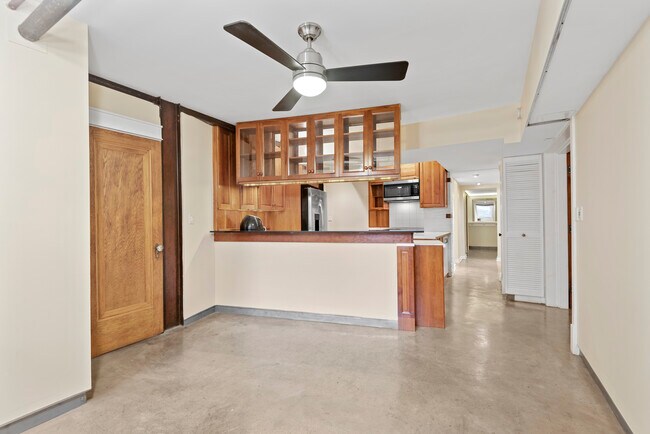 Living Room looking at Kitchen - 2749 N Hampden Ct Unit 1G