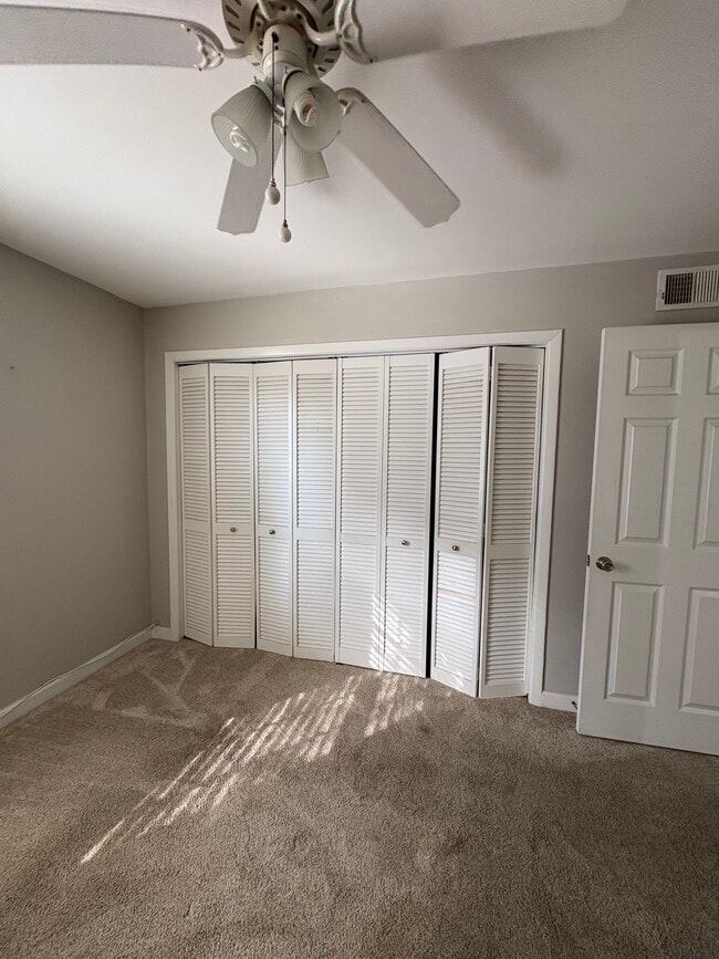 Guest bedroom closet - 108 Alameda Ct Unit 233