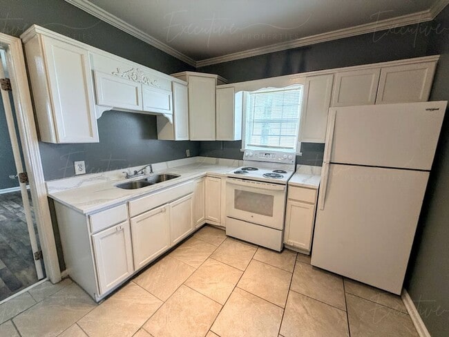 Photo - Move-In Ready in Sulphur | Updated 2BR Home w/ Covered Front Porch + Granite Countertops